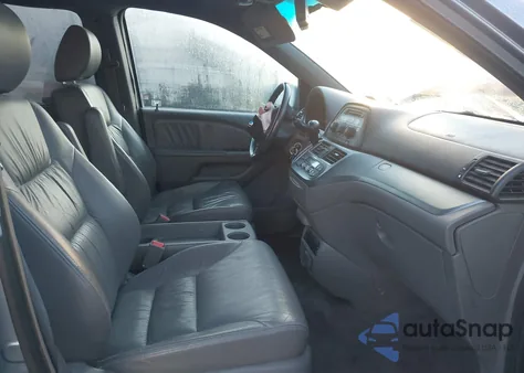 2009 Honda Odyssey Ex-L from USA, damaged, VIN 5FNRL387X9B016061